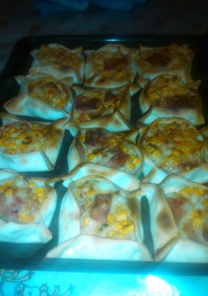 Una foto de Canastitas de choclo, jamón y queso
