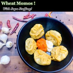 A picture of Steamed Wheat Momos (with Soya stuffing).