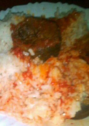 A picture of Steamed rice and mud fish stew.