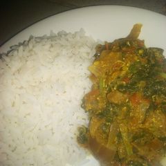 White rice with spinach and egg sauce A picture of White rice with spinach and egg sauce.