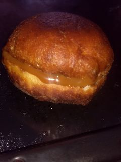 Una foto de Berlines fritos con manjar