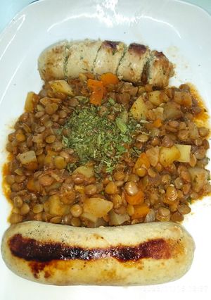 Une photo de Boudin blanc et lentilles