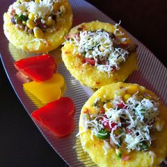 A picture of Sprouts filled corn dhokla.