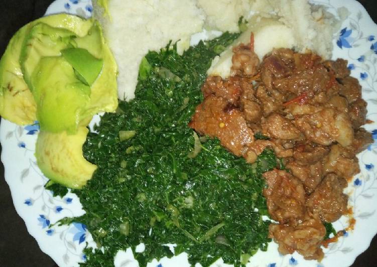 Recipe of Quick Ugali sukuma served with mutton and guacamole