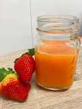 Licuado de naranja y fresas
