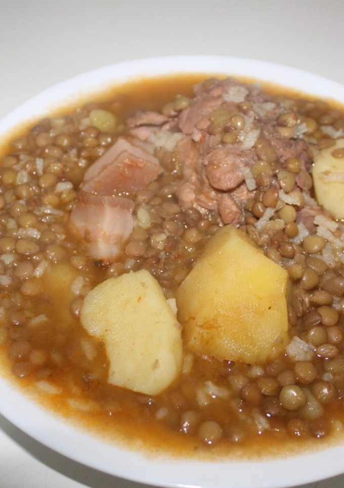 Una foto de Lentejas con arroz y patatas