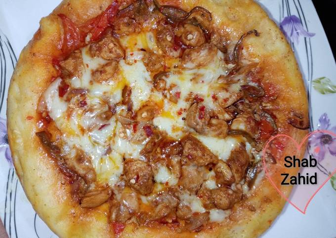 Steps to Prepare Homemade Chicken Tikka Pizza baked in Pateela