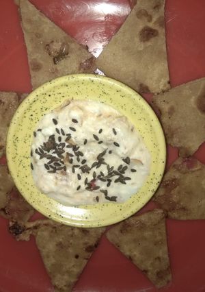 A picture of Onion tomato paratha.