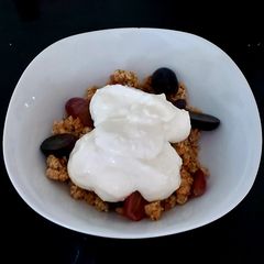 A picture of My yummy healthy Breakfast Clusters with grapes & Coconut yogurt.