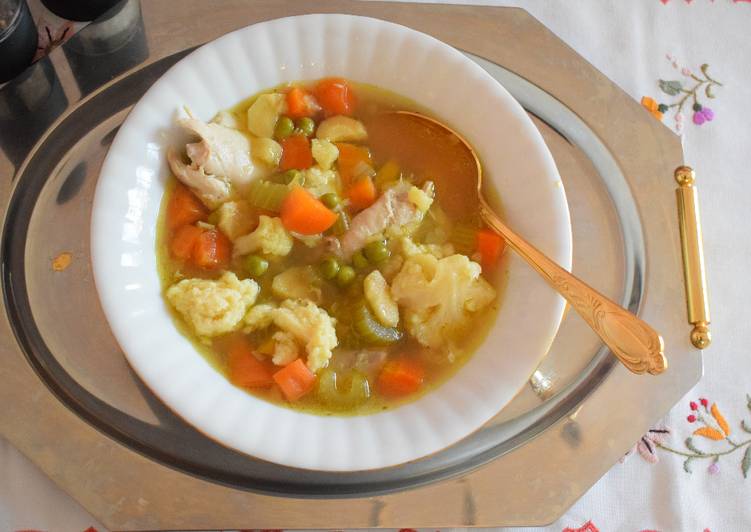 Chicken and vegetable soup with semolina dumplings