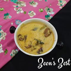 A picture of Kadhi Pakoras with Water Spinach.