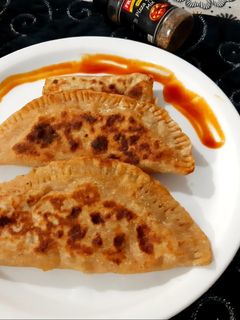 पिज़्ज़ा पराठा(pizza paratha recipe in hindi) रेसिपी मुख्य फोटो