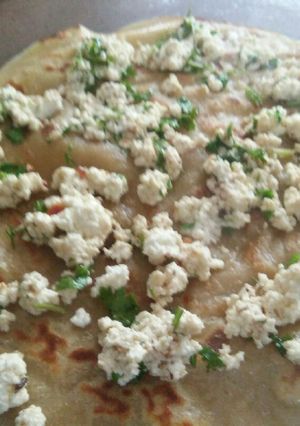 A picture of Paneer stuffed wheat dosa.