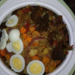 A picture of Jallop rice with egg.