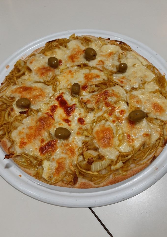 Una foto de Pizza fugazzeta al curry