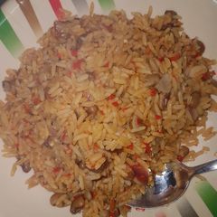 A picture of Jollof rice and beans.