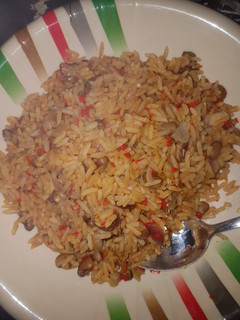 A picture of Jollof rice and beans.