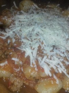Una foto de Ñoquis Con Salsa Bolognesa