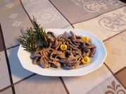 Una foto di straccetti di manzo al limone