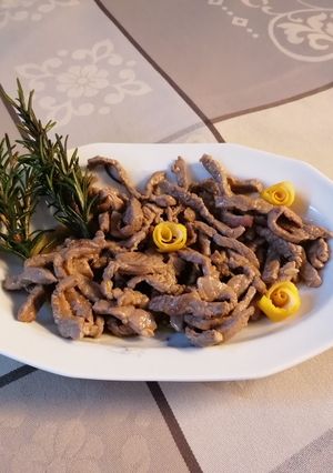 A picture of Beef Strips with Rosemary and Lemon.