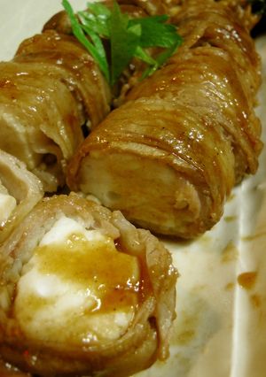 A picture of Hanpen Wrapped in Sliced Pork Belly.