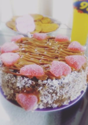 Una foto de Torta de Chocolate bañada en manjar y coco
