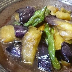A picture of Eggplant and Shishito Peppers Deep-fried and Simmered.