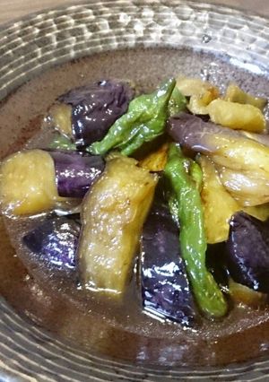 A picture of Eggplant and Shishito Peppers Deep-fried and Simmered.