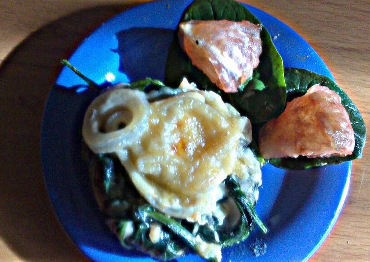 sig's Spinach with mild onion sauce on grilled apples