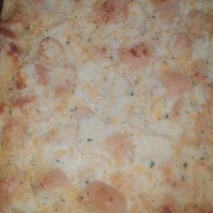 A picture of Savory Cheese garlic bread pudding.
