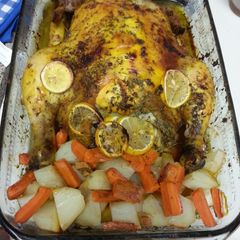 A picture of WHOLE BAKE CHICKEN WITH POTATOES AND CARROTS.