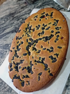 A picture of Peanut butter and mixed dry fruit cake.