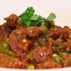 A picture of Spicy Beef Masala with Green Pea's.