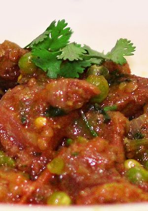 A picture of Spicy Beef Masala with Green Pea's.