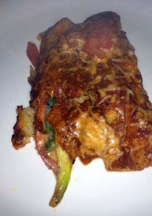 A picture of garden vegetable enchiladas.