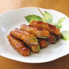 A picture of Sweet and Salty Carrot and Pepper Filled Teriyaki Pork Rolls.