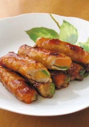 A picture of Sweet and Salty Carrot and Pepper Filled Teriyaki Pork Rolls.