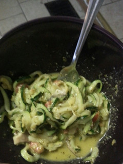A picture of Zucchini pasta in creamy pesto sauce.