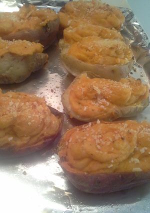 A picture of Once baked sweet & white potatoes.