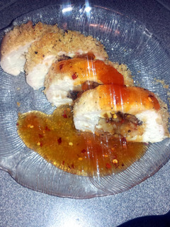 A picture of Bacon,mushroom stuffed chicken breast.