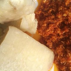 A picture of White yam and egg sauce.