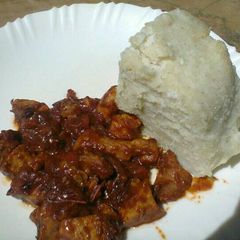 A picture of Pork With Ugali.