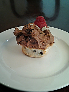 A picture of Chocolate Chip Angel.Food Cupcakes with Chocolate Whipped Cream Frosting.