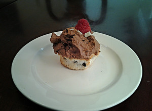 A picture of Chocolate Chip Angel.Food Cupcakes with Chocolate Whipped Cream Frosting.