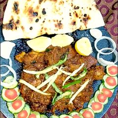 A picture of Mutton Tawa karahi With homemade Tawa Tandori roti 😋😋😋😋😋😋.