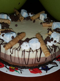 Una foto de Cheesecake de tres chocolates