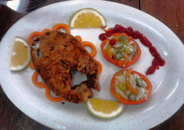 Garnished Pan fry fish  with vegetable salad
