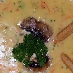 A picture of Broccoli and Three cheddar soup.