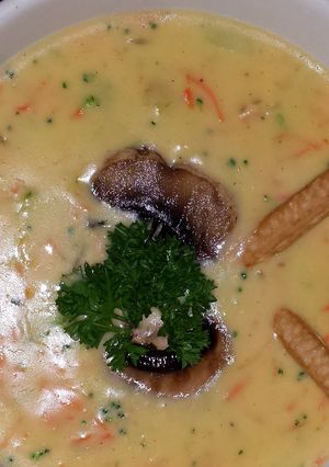 A picture of Broccoli and Three cheddar soup.