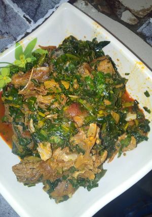 A picture of Vegetables soup with goat meat.